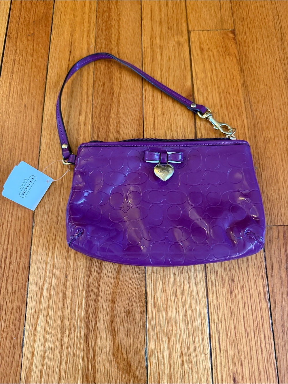 Coach Patent Purple Wristlet with Gold Heart Charm